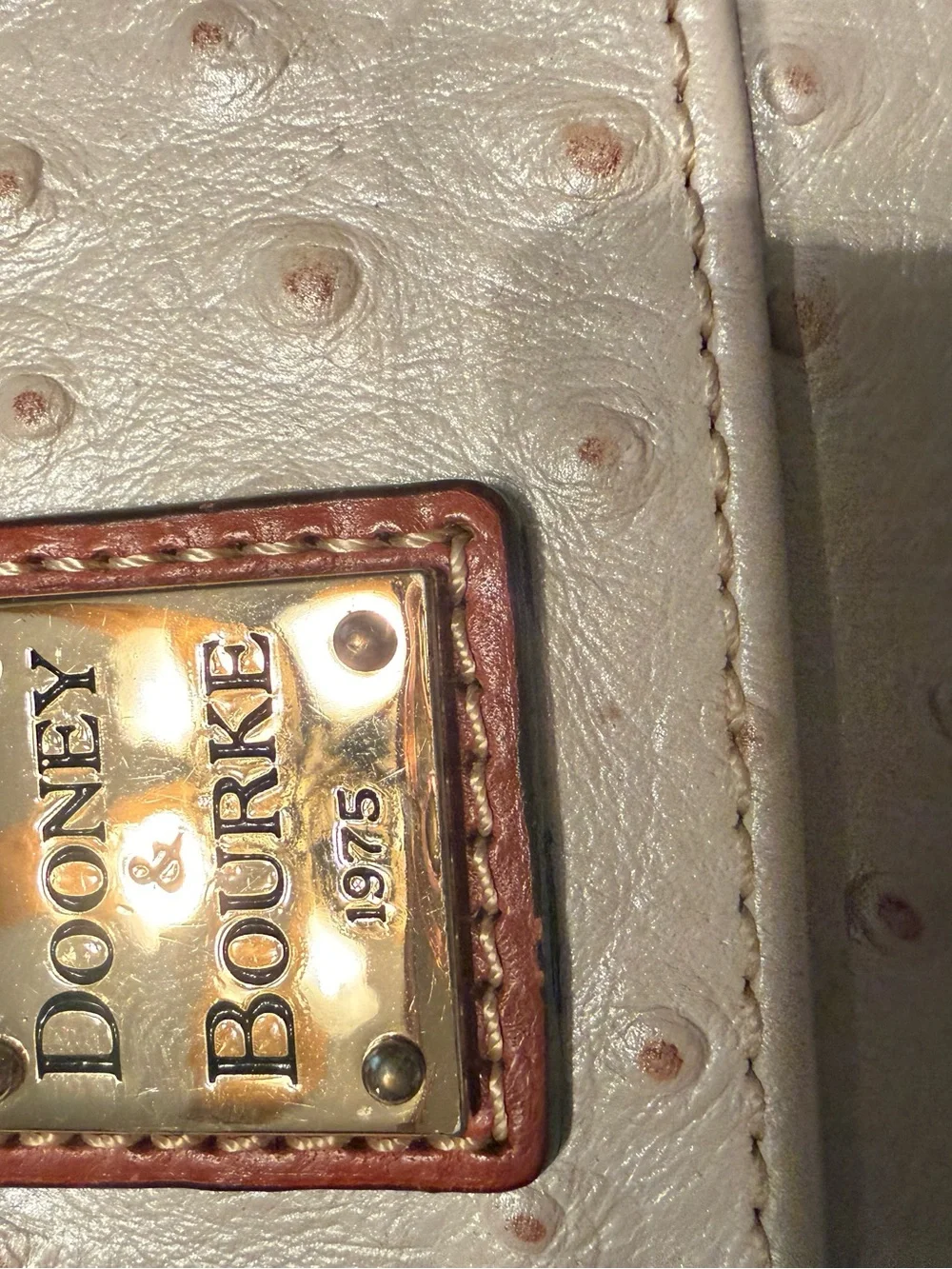 Dooney & Bourke Cream Ostrich-Texture Zip Wallet